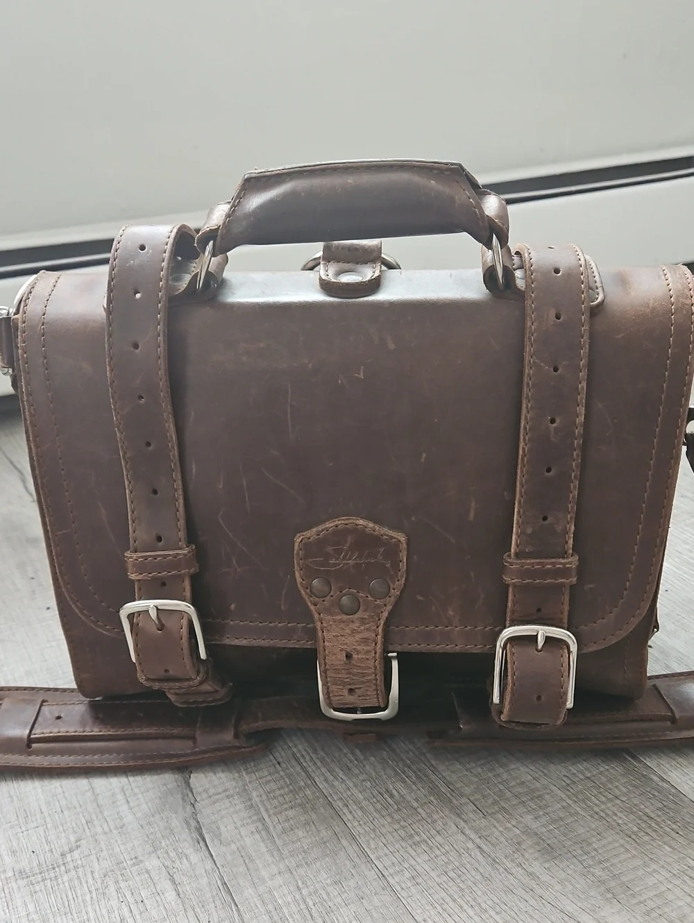 Saddleback Leathers Convertible Briefcase/Backpack With Adjustable Straps.